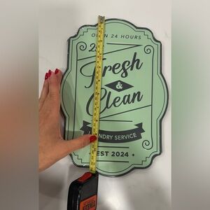 Laundry decir wall sign. Brand new still rapped .